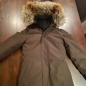 TNA parka in army green.